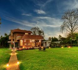 Experience the epitome of tranquility at Tranquility Farmstay in Sainik Farms, Delhi! 