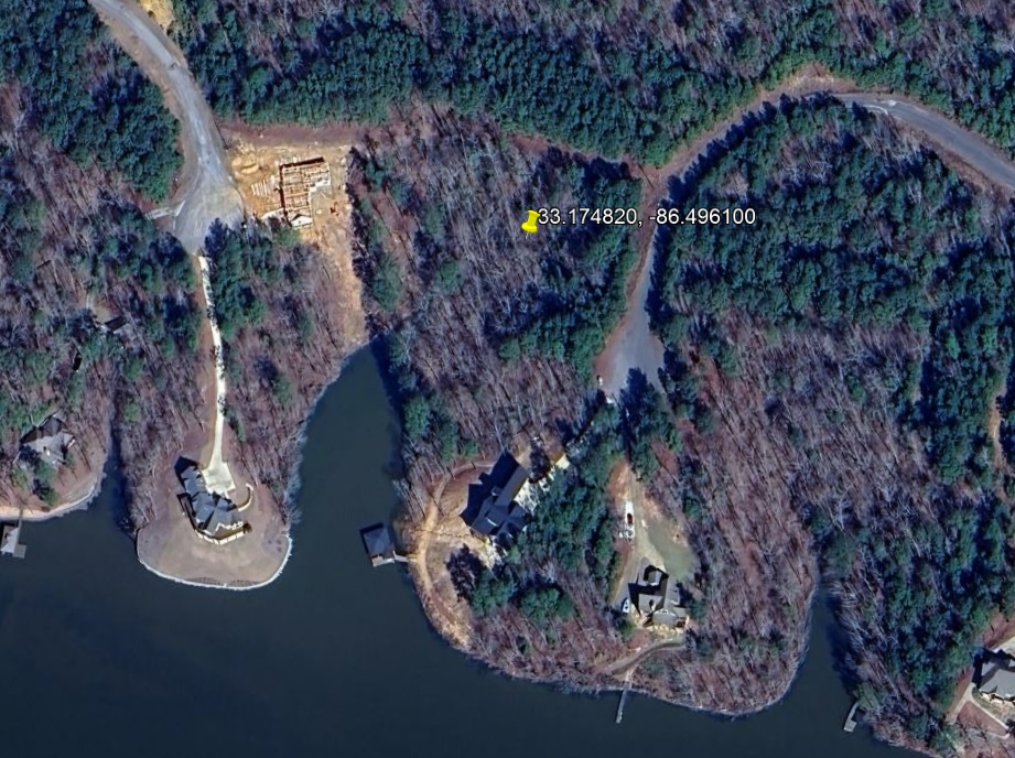  looking to buy a water front land in Talladega County